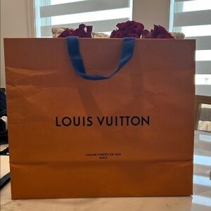 Louis Vuitton Bold Orange Bag with Blue Handles